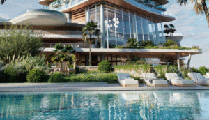 Luxurious resort pool area with a modern building and lush landscaping